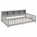 Lit enfant en bois gris avec étagères intégrées
