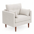 Fauteuil en tissu beige avec coussins et pieds en bois